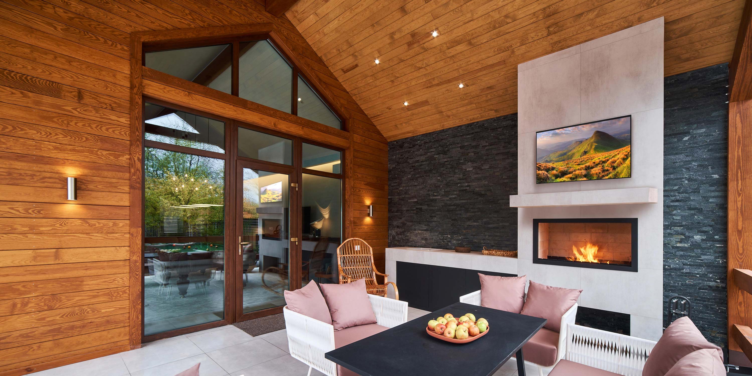 covered porch with Seura technology and outdoor entertainment