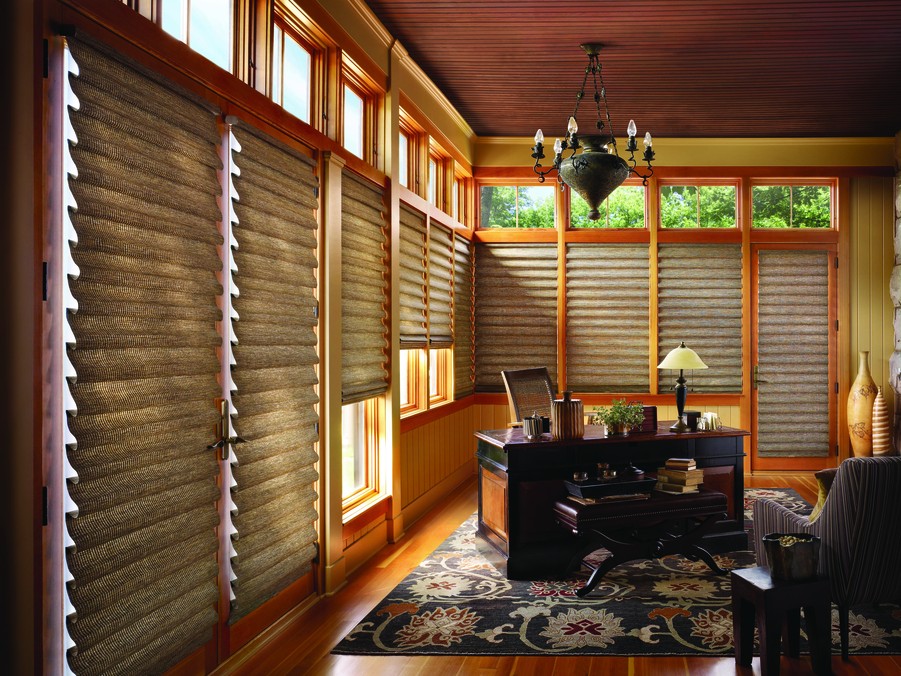 A home office featuring Hunter Douglas shades.